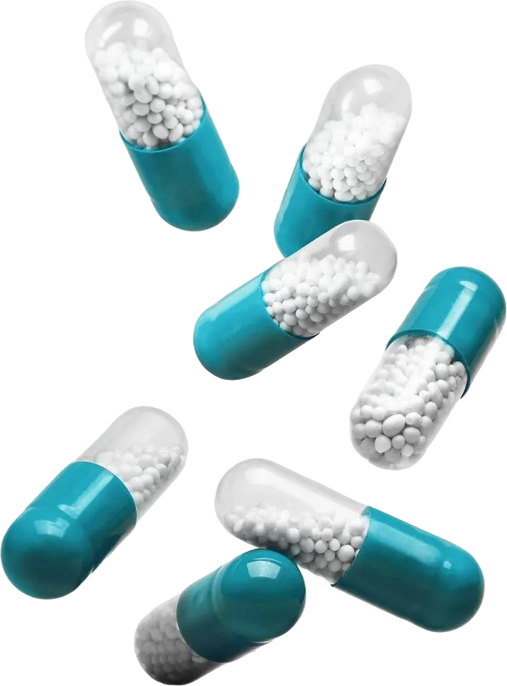 capsulas-azules-blancas-que-caen-sobre-fondo-blanco